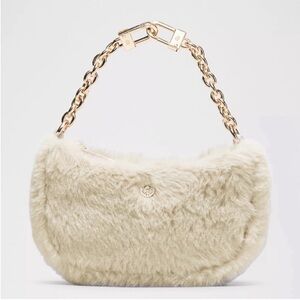 Lululemon Athletica Cream Faux Fur mini nano bag